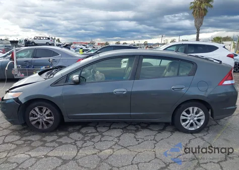 2013 Honda Insight Ex z USA, uszkodzony, nr VIN JHMZE2H70DS002121